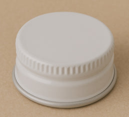 Capsules en émail blanc 83R3 avec doublure PVDC – Fermetures de bouteilles propres et sécurisées